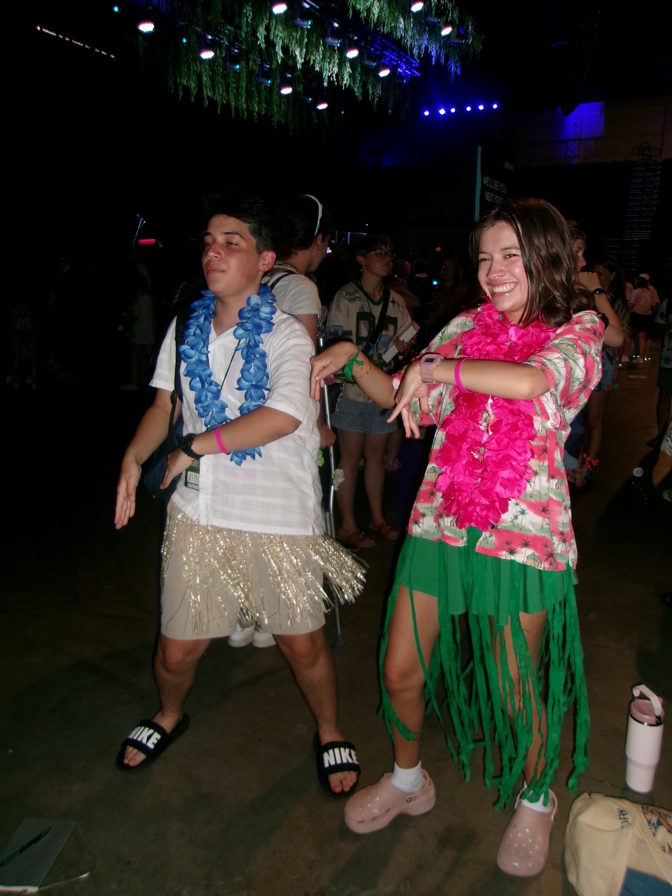 Tessa and a friend enjoying a Hawaiian celebration
